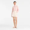Ballerina – Strickpullover mit hohem Kragen Ballerina – Strickpullover mit hohem Kragen